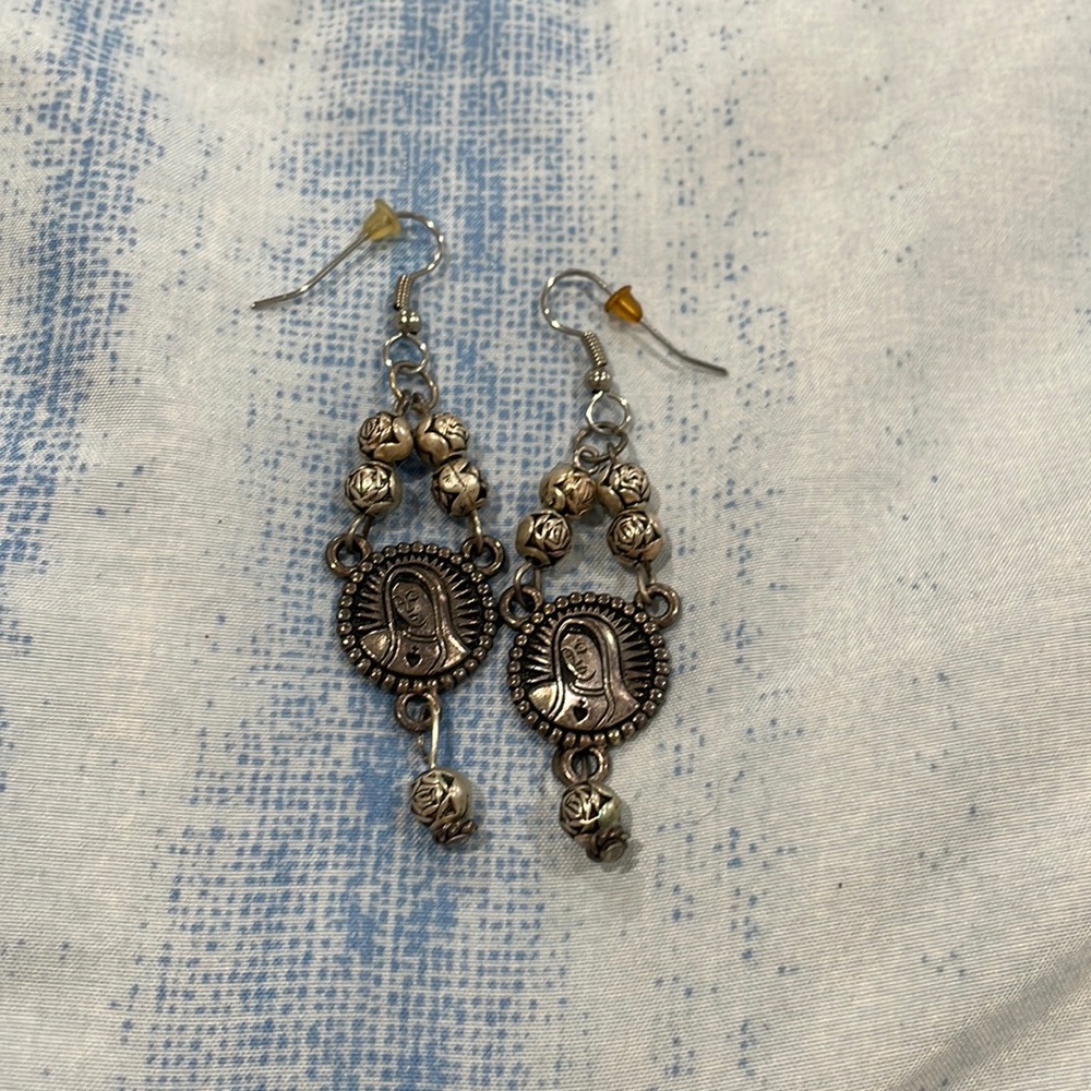 Beautiful steel Virgin Mary earring set.